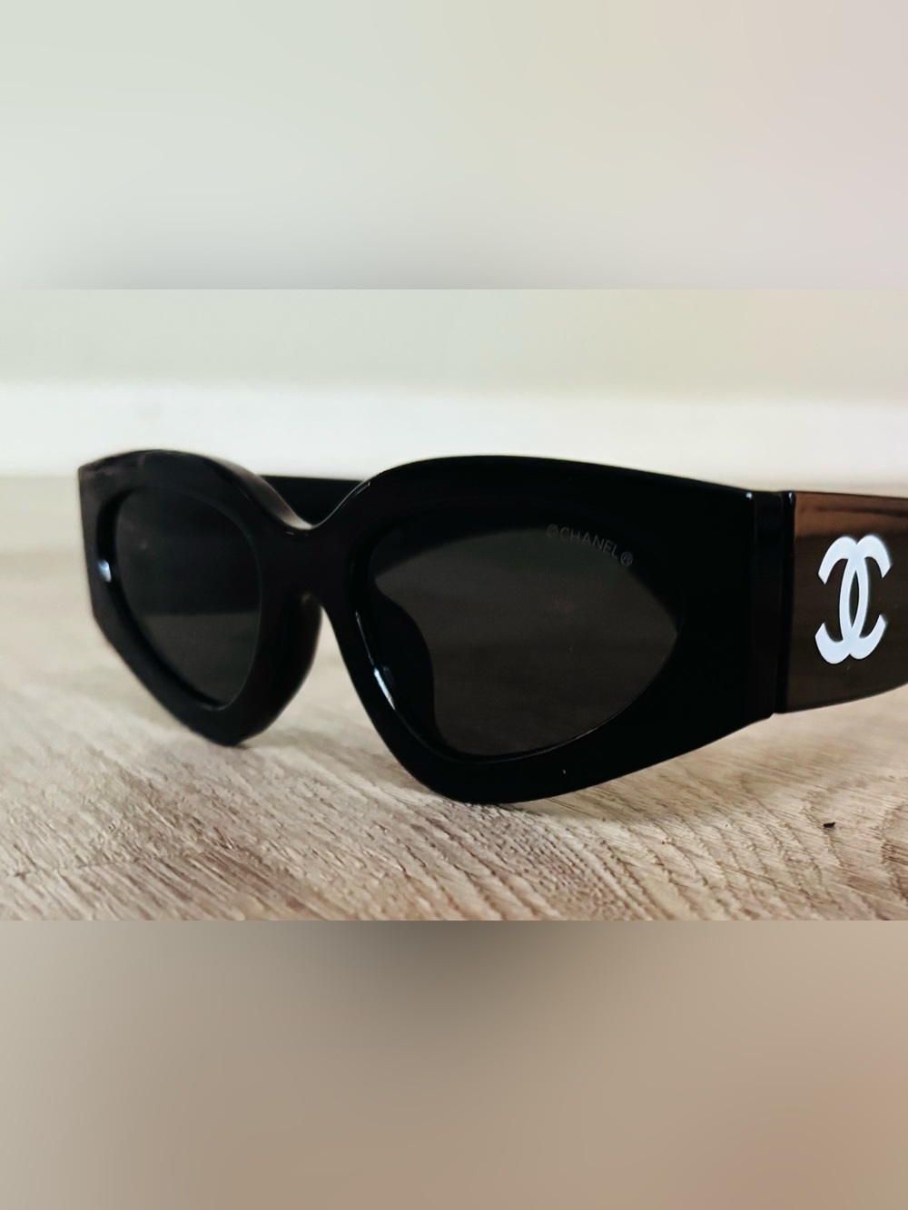CHANEL Black Cat-Eye Sunglasses with Dark Lenses